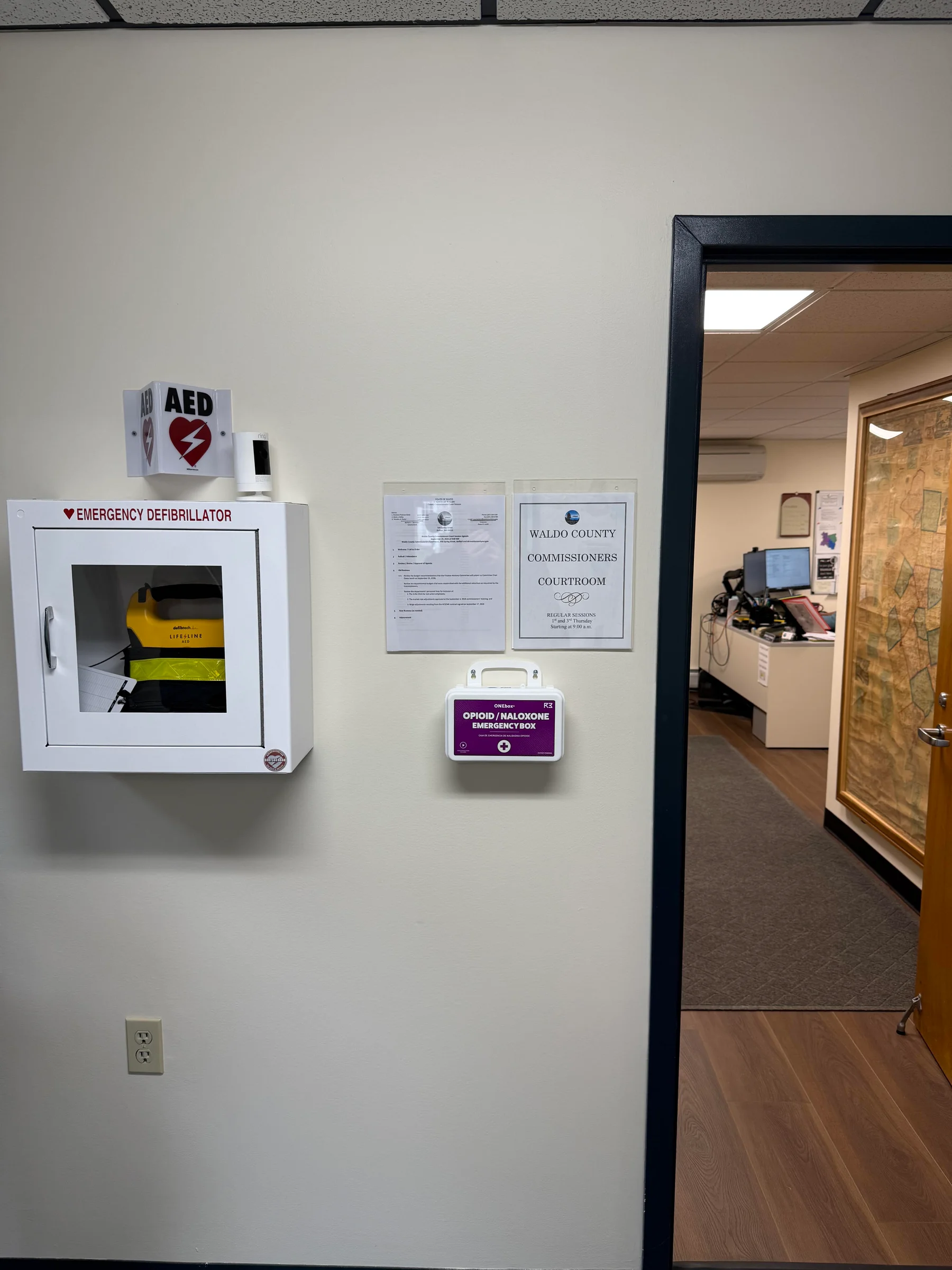 A ONEbox next to an AED at the Waldo County Commission.